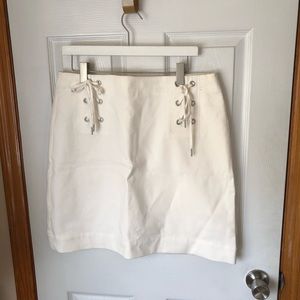 Grommets tie up skirt.